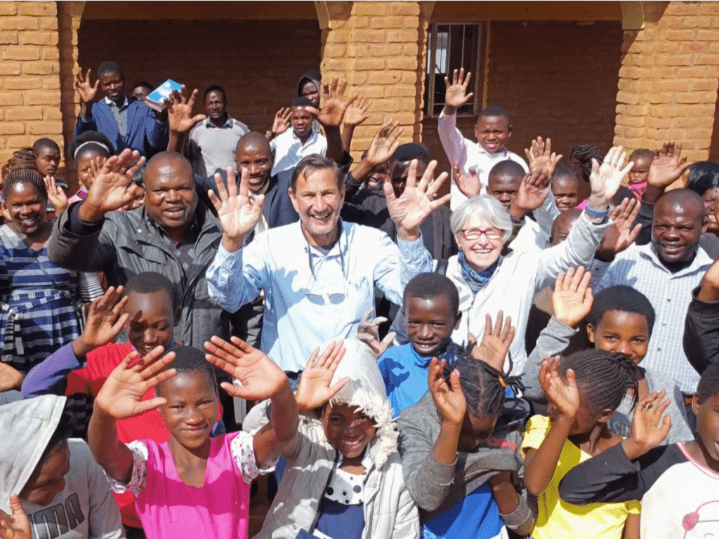 Africa Monitoring Visit - Founders and Malawi Partners Waving